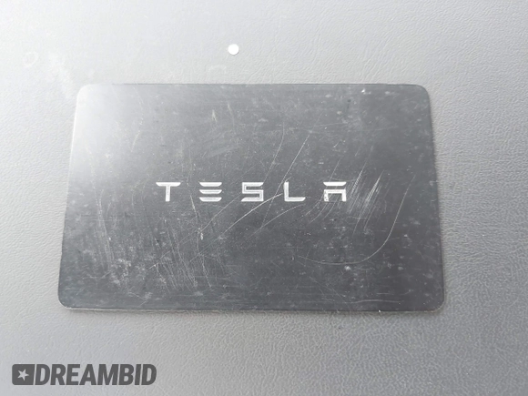 2023 Tesla Model Y Long Range with VIN 7SAYGDEE7PA194998, listed as a IAAI auction lot 41787170 with 16,221 mi miles and . Bid and sale history available at DreamBid. Image 11.