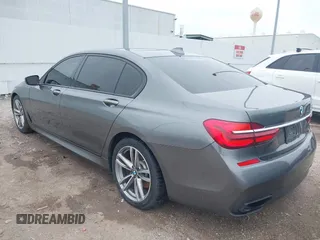 2016 BMW 7 Series 740i with VIN WBA7E2C56GG546920, listed as a IAAI auction lot 41610698 with 119,689 mi miles. Bid and sale history available at carsss.com. Image 3.
