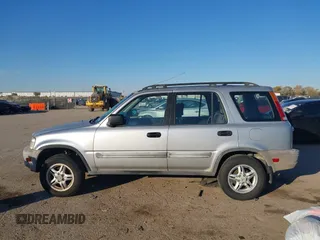 1999 Honda CR-V LX with VIN JHLRD284XXC019021, listed as a IAAI auction lot 41031098 with 204,206 mi miles. Bid and sale history available at carsss.com. Image 14.