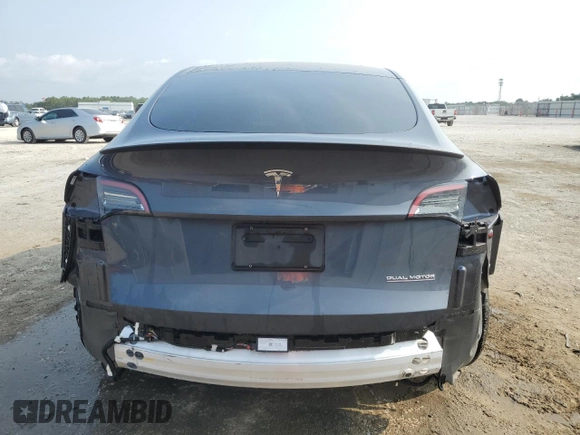 2022 Tesla Model Y Performance with VIN 7SAYGDEF4NF447462, listed as a Copart auction lot 58306595 with 61,671 mi miles and Non repairable. Bid and sale history available at DreamBid. Image 6.