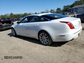 2013 Jaguar XJ z VIN SAJWJ1CD3D8V48059, wystawiony jako Copart lot #88537745 z przebiegiem 139 706 mil mil oraz Szkoda całkowita • Salvage title. Historia ofert i sprzedaży dostępna na DreamBid. Obrazek 2.