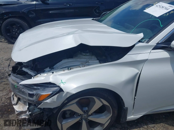 2019 Honda Accord Touring with VIN 1HGCV2F96KA015987, listed as a IAAI auction lot 42528744 with 174,735 mi miles and . Bid and sale history available at DreamBid. Image 18.