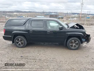 2011 Honda Ridgeline RT z VIN 5FPYK1F24BB010604, wystawiony jako IAAI lot #41941553 z przebiegiem 37 814 mil mil oraz . Historia ofert i sprzedaży dostępna na DreamBid. Obrazek 14.