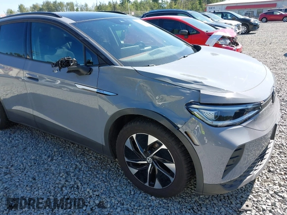 2021 Volkswagen ID.4 Pro S z VIN WVGTMPE20MP058882, wystawiony jako IAAI lot #42317440 z przebiegiem 64 473 mil mil oraz . Historia ofert i sprzedaży dostępna na DreamBid. Obrazek 6.