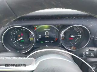 2023 Jeep Wrangler Sahara with VIN 1C4JJXP60PW556336, listed as a IAAI auction lot 39553199 with 10,437 mi miles and . Bid and sale history available at DreamBid. Image 7.