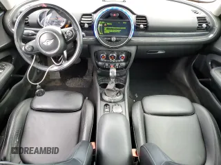 2017 MINI Clubman Cooper S z VIN WMWLU5C5XH2E83566, wystawiony jako Copart lot #57919305 z przebiegiem 89 983 mil mil oraz Tytuł czysty. Historia ofert i sprzedaży dostępna na DreamBid. Obrazek 8.