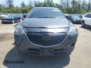 2014 Mazda CX-9 Grand Touring with VIN JM3TB3DV9E0444720, listed as a Copart auction lot 63687855 with 144,568 mi miles and Salvage title. Bid and sale history available at DreamBid. Image 5.
