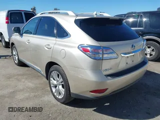 2011 Lexus RX 450h with VIN JTJBC1BAXB2420753, listed as a IAAI auction lot 41823358 with 102,714 mi miles and . Bid and sale history available at DreamBid. Image 3.
