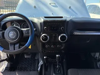 2012 Jeep Wrangler Arctic z VIN 1C4AJWBG2CL229572, wystawiony jako Copart lot #48719465 z przebiegiem 82 619 mil mil oraz Czysty tytuł • Clean title. Historia ofert i sprzedaży dostępna na DreamBid. Obrazek 9.