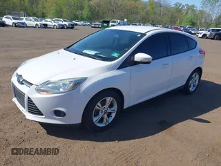 2013 Ford Focus SE with VIN 1FADP3K26DL262144, listed as a IAAI auction lot 42140228 with 107,379 mi miles. Bid and sale history available at carsss.com. Image 2.