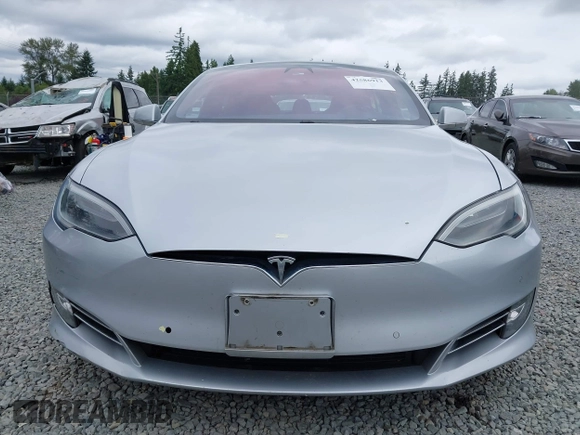 2017 Tesla Model S 60 z VIN 5YJSA1E11HF217633, wystawiony jako IAAI lot #42586913 z przebiegiem 152 987 mil mil oraz . Historia ofert i sprzedaży dostępna na DreamBid. Obrazek 12.