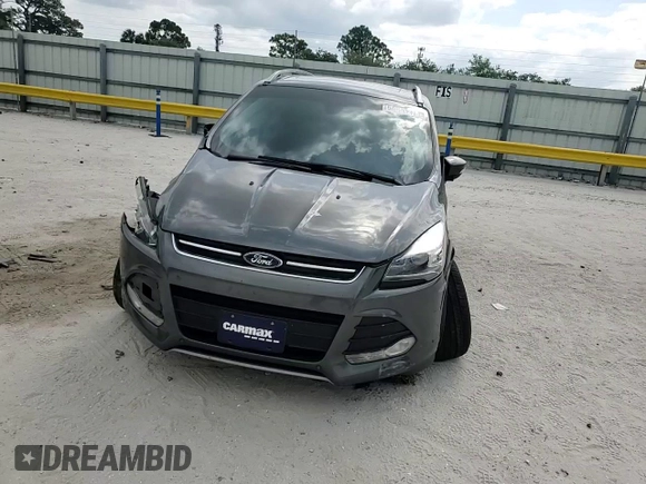 2016 Ford Escape Titanium with VIN 1FMCU9J91GUA47829, listed as a Copart auction lot 54051275 with 86,046 mi miles and Salvage Title. Bid and sale history available at DreamBid. Image 14.