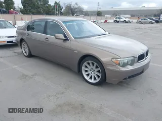 2004 BMW 7 Series 745Li with VIN WBAGN63494DS45716, listed as a IAAI auction lot 41906522 with 127,292 mi miles. Bid and sale history available at carsss.com. Image 1.