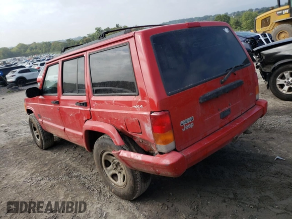 1998 Jeep Cherokee Sport with VIN 1J4FJ68S5WL107496, listed as a Copart auction lot 74401404 with 225,257 mi miles and Salvage Title. Bid and sale history available at carsss.com. Image 2.