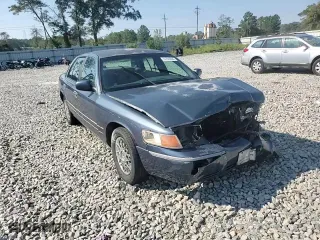 1998 Mercury Grand Marquis GS with VIN 2MEFM74W4WX656765, listed as a Copart auction lot 72720054 with 147,038 mi miles and Salvage Title. Bid and sale history available at carsss.com. Image 10.