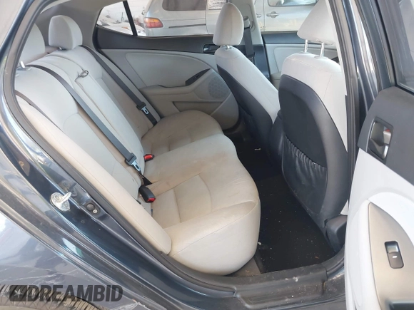 2015 Kia Optima LX with VIN KNAGM4A70F5592109, listed as a IAAI auction lot 42053533 with 159,401 mi miles. Bid and sale history available at carsss.com. Image 8.