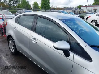 2014 Kia Rio LX with VIN KNADM4A31E6413780, listed as a IAAI auction lot 41996928 with 93,446 mi miles and . Bid and sale history available at DreamBid. Image 13.