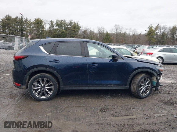 2019 Mazda CX-5 Signature with VIN JM3KFBEY4K0525171, listed as a IAAI auction lot 41706635 with 88,293 mi miles. Bid and sale history available at carsss.com. Image 13.