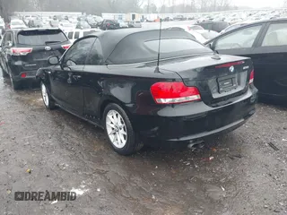 2011 BMW 1 Series 128i with VIN WBAUL7C52BVM79176, listed as a IAAI auction lot 41387249 with 99,145 mi miles and . Bid and sale history available at carsss.com. Image 3.
