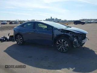 2024 Toyota Prius SE z VIN JTDACACU9R3022803, wystawiony jako IAAI lot #41899408 z przebiegiem 4 374 mil mil oraz . Historia ofert i sprzedaży dostępna na DreamBid. Obrazek 14.