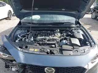 2024 Mazda 3 S Carbon Edition with VIN 3MZBPBCM2RM403824, listed as a IAAI auction lot 42612315 with 8,261 mi miles and . Bid and sale history available at DreamBid. Image 10.