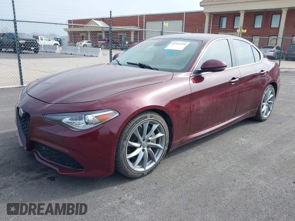 2018 Alfa Romeo Giulia with VIN ZARFAEBN8J7566581, listed as a IAAI auction lot 41524224 with 56,863 mi miles. Bid and sale history available at carsss.com. Image 2.