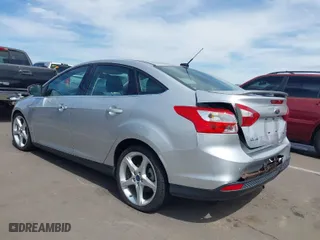 2012 Ford Focus Titanium with VIN 1FAHP3J29CL262348, listed as a IAAI auction lot 41812310 with 81,645 mi miles. Bid and sale history available at carsss.com. Image 3.