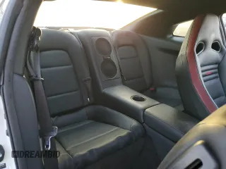 2012 Nissan GT-R Premium z VIN JN1AR5EF3CM251325, wystawiony jako Copart lot #77342524 z przebiegiem 70 923 mil mil oraz Szkoda całkowita • Salvage title. Historia ofert i sprzedaży dostępna na DreamBid. Obrazek 10.