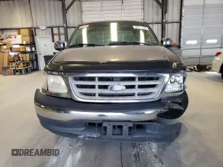 2000 Ford F-150 XL with VIN 1FTZX1726YKB41994, listed as a Copart auction lot 69300034 with Not provided miles and Salvage title. Bid and sale history available at DreamBid. Image 5.