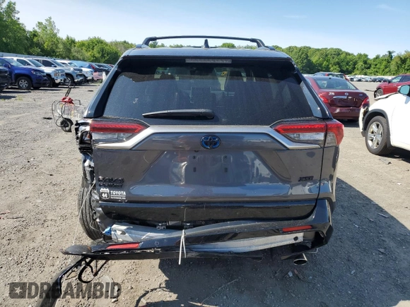 2022 Toyota RAV4 XSE with VIN JTMFB3FV9ND101157, listed as a Copart auction lot 59044315 with 54,591 mi miles and Salvage title. Bid and sale history available at DreamBid. Image 6.