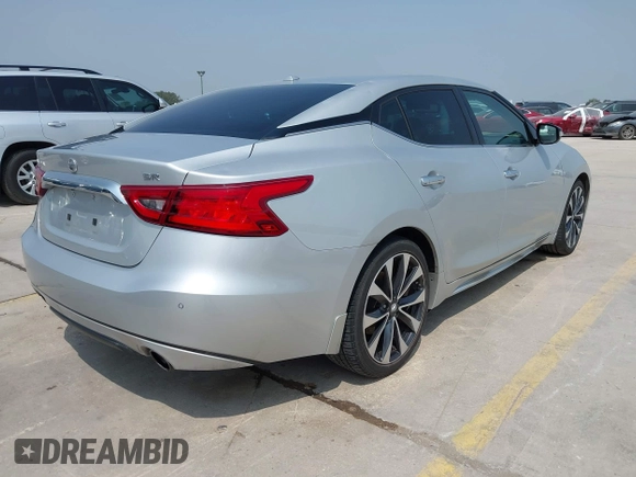 2017 Nissan Maxima SR z VIN 1N4AA6AP9HC397126, wystawiony jako IAAI lot #42291477 z przebiegiem 115 201 mil mil oraz . Historia ofert i sprzedaży dostępna na DreamBid. Obrazek 4.