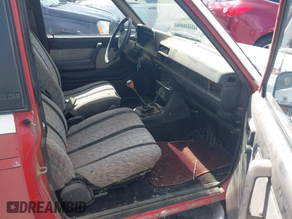 1984 Datsun 720 z VIN JN6ND06Y5EW020107, wystawiony jako IAAI lot #42281402 z przebiegiem 224 687 mil mil oraz . Historia ofert i sprzedaży dostępna na DreamBid. Obrazek 5.