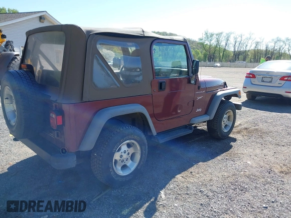2002 Jeep Wrangler Sport with VIN 1J4FA49SX2P713303, listed as a IAAI auction lot 42136848 with 152,822 mi miles. Bid and sale history available at carsss.com. Image 4.