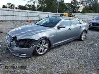 2015 Jaguar XJ Portfolio z VIN SAJWJ2GD2F8V75238, wystawiony jako Copart lot #73633984 z przebiegiem 102 545 mil mil oraz Szkoda całkowita • Salvage title. Historia ofert i sprzedaży dostępna na DreamBid. Obrazek 1.