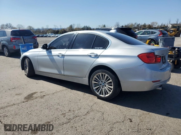 2014 BMW 3 Series 335i xDrive with VIN WBA3B9G57ENR91797, listed as a Copart auction lot 53724325 with 164,279 mi miles and Salvage Title. Bid and sale history available at DreamBid. Image 2.