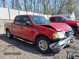 2003 Ford F-150 XLT with VIN 1FTRW07L13KD81923, listed as a IAAI auction lot 42112168 with 147,039 mi miles. Bid and sale history available at carsss.com. Image 1.
