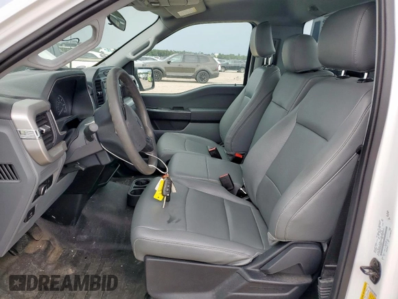 2022 Ford F-150 XL with VIN 1FTMF1C56NKD24644, listed as a Copart auction lot 63307315 with 64,704 mi miles and Salvage title. Bid and sale history available at DreamBid. Image 7.