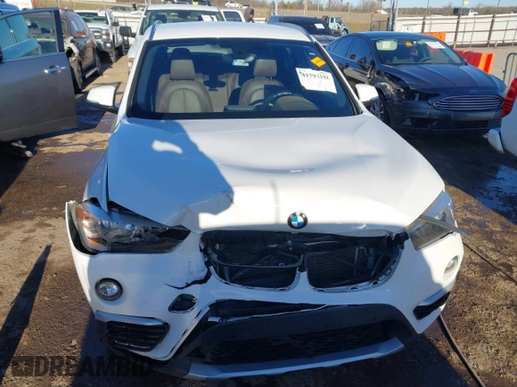 2016 BMW X1 xDrive28i with VIN WBXHT3C37GP888249, listed as a IAAI auction lot 41794102 with 116,175 mi miles and . Bid and sale history available at DreamBid. Image 12.