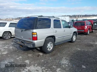 2004 GMC Yukon SLT with VIN 1GKEK13Z64J254137, listed as a IAAI auction lot 41499284 with 147,310 mi miles. Bid and sale history available at carsss.com. Image 4.
