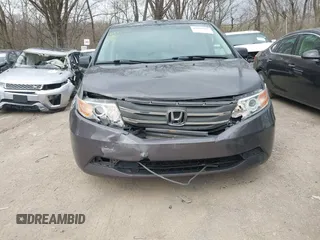 2012 Honda Odyssey EX-L with VIN 5FNRL5H60CB081866, listed as a IAAI auction lot 41835701 with 151,236 mi miles and . Bid and sale history available at DreamBid. Image 12.