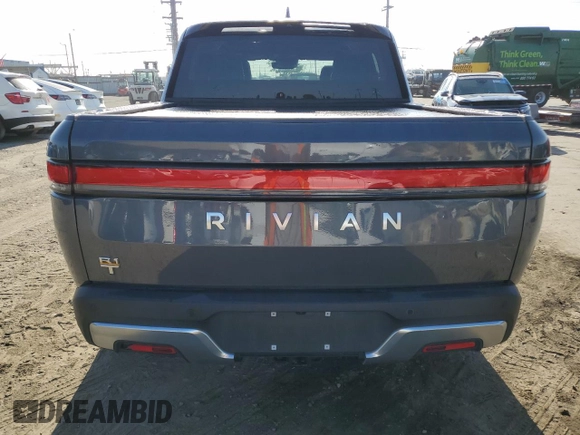 2022 Rivian R1T Adventure z VIN 7FCTGAAA9NN008771, wystawiony jako Copart lot #56243835 z przebiegiem 31 006 mil mil oraz Szkody całkowita. Historia ofert i sprzedaży dostępna na DreamBid. Obrazek 6.
