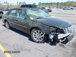 2009 Cadillac DTS w/1SA with VIN 1G6KD57YX9U114862, listed as a IAAI auction lot 41879883 with 112,301 mi miles. Bid and sale history available at carsss.com. Image 1.