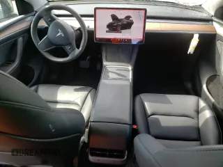 2024 Tesla Model Y Long Range с VIN 7SAYGAEE6RF127846, выставлен на аукционе Copart как лот 56968035 с пробегом 23 328 миль миль и Списание • Salvage title. История ставок и продаж доступна на DreamBid. Изображение 8.