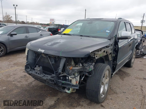 2011 Jeep Grand Cherokee Overland with VIN 1J4RS6GT7BC518123, listed as a IAAI auction lot 41277374 with 163,752 mi miles and . Bid and sale history available at DreamBid. Image 17.