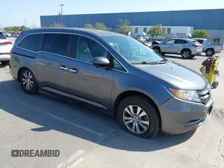 2014 Honda Odyssey EX-L with VIN 5FNRL5H6XEB045279, listed as a IAAI auction lot 42429400 with 68,023 mi miles and . Bid and sale history available at DreamBid. Image 1.