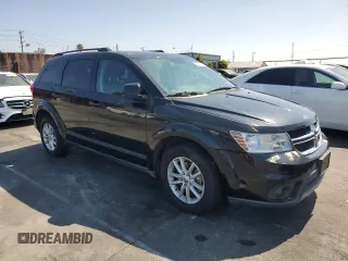 2015 Dodge Journey SXT with VIN 3C4PDCBG6FT718131, listed as a Copart auction lot 62214265 with 108,986 mi miles and Salvage title. Bid and sale history available at DreamBid. Image 4.