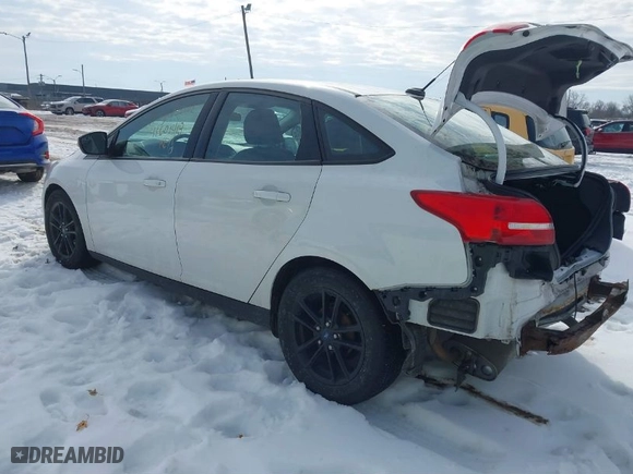 2015 Ford Focus SE with VIN 1FADP3F21FL312736, listed as a IAAI auction lot 41601418 with 137,540 mi miles. Bid and sale history available at carsss.com. Image 3.