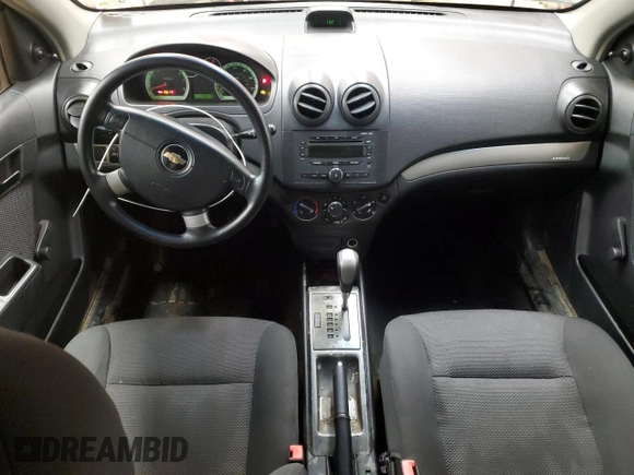 2007 Chevrolet Aveo LS z VIN KL1TD566X7B168714, wystawiony jako Copart lot #47942785 z przebiegiem 116 010 mil mil oraz Szkody całkowita. Historia ofert i sprzedaży dostępna na DreamBid. Obrazek 8.