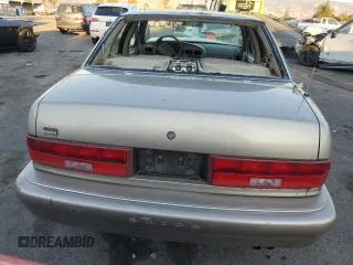 1996 Buick Regal Custom with VIN 2G4WB52K5T1517380, listed as a Copart auction lot 83106314 with 112,411 mi miles and Salvage title. Bid and sale history available at DreamBid. Image 6.