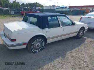 1991 Cadillac Seville z VIN 1G6KS53B9MU820155, wystawiony jako IAAI lot #40035441 z przebiegiem 78 021 mil mil oraz . Historia ofert i sprzedaży dostępna na DreamBid. Obrazek 4.